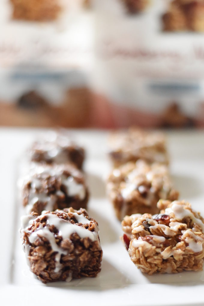 Double Chocolate Granola Bites with Strawberry Yogurt Drizzle AND Cranberry Almond Granola Bites with Vanilla Bean Yogurt Drizzle - made with Van's Simply Delicious Gluten-Free Granola and Wallaby Organic Greek Yogurt | Feathers in Our Nest